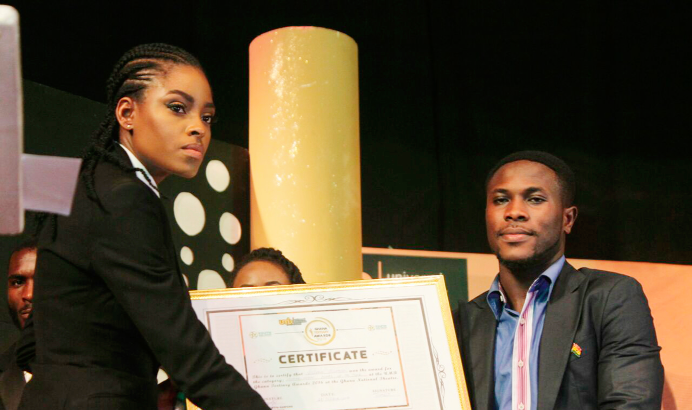  Victoria Micheals (left) being presented with the humanitarian award.