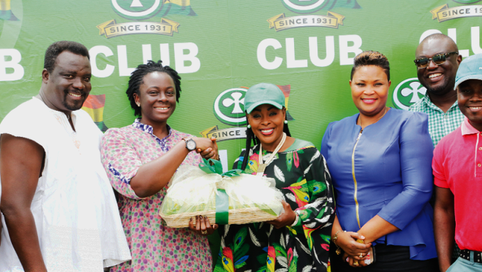  Ewurafua Addo-Atuah, Senior Brand Communications Manager at ABL presenting a kente cloth to Akosua Agyepong.