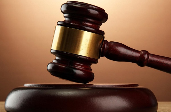 Court remands social worker for theft and assault