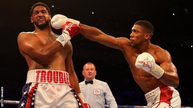 Anthony Joshua knocks out Dominic Breazeale in round seven