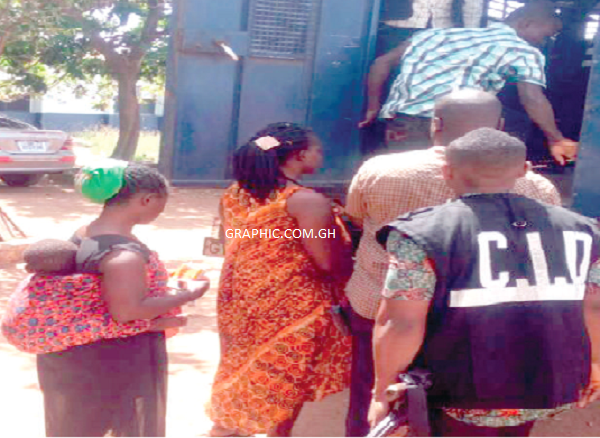 Some of the accused persons boarding a police vehicle after court proceedings.