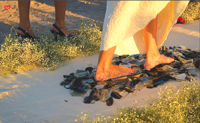 The broken glass represent fears, hardship and challenges that they will have to overcome