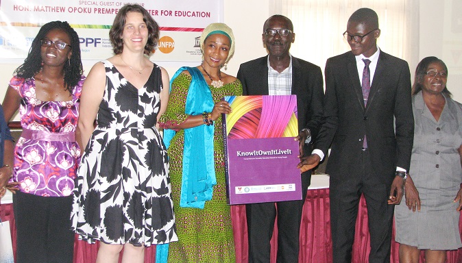 Ms Barbra Ayisi Acher(3rd left), a Deputy Minister for Education, launching  "KnowitOwnitLiveit", with her is Anne Coolen (2nd left), Executive Director - PPAG and Country Director MSIG  and Aaron Atimpe (2nd right),Youth Advocate. PICTURE:ESTHER ADJEI