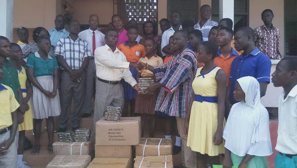 Nana Nkwantabisa (right), presenting the items to a representative of the GES 