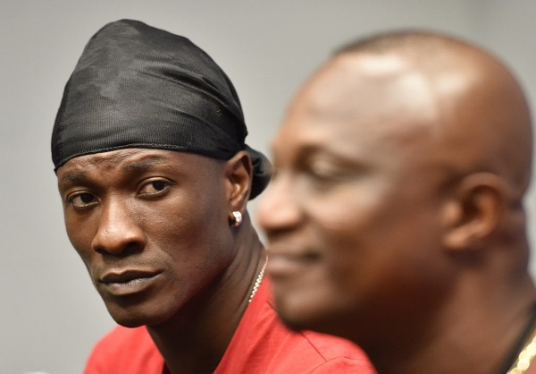 Asamoah Gyan and Kwasi Appiah