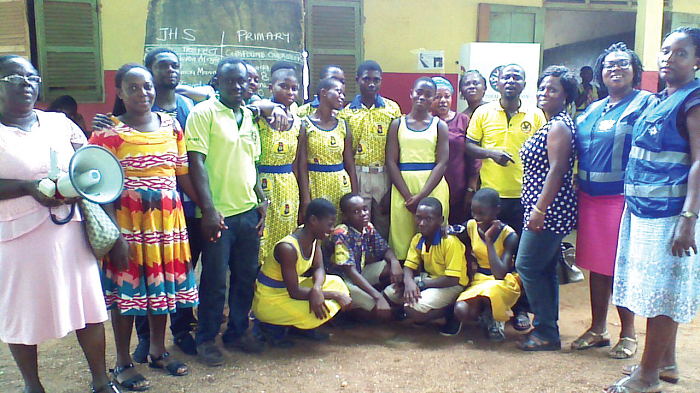 The new prefects, some  teachers and the electoral officers in a group photograph.
