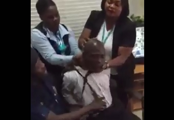 uniBank staff slapping suspected swindler