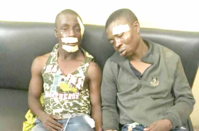 Ndubueze Odoemenam (left) and Chiokoko Amade at the Cantonments Police Station 