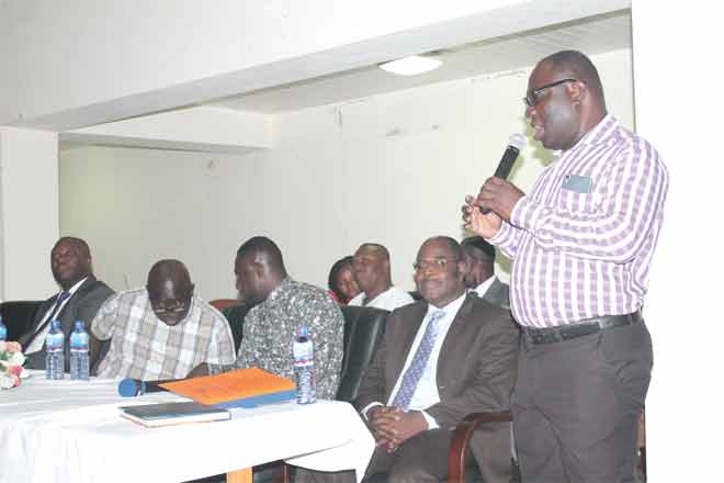 Mr John Afetorgbor (right), Head of Curriculum Development and Research Department, speaking at the workshop. Also in the photograph is Prof. Jonathan Fletcher (2nd right), Dean of the School of Education at the University of Ghana. Picture: Maxwell Ocloo