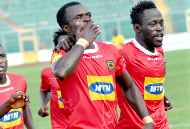 Kotoko’s lone goal hero, Amos Frimpong, blows a kiss to the fans as he celebrates with teammate Yakubu Mohammed