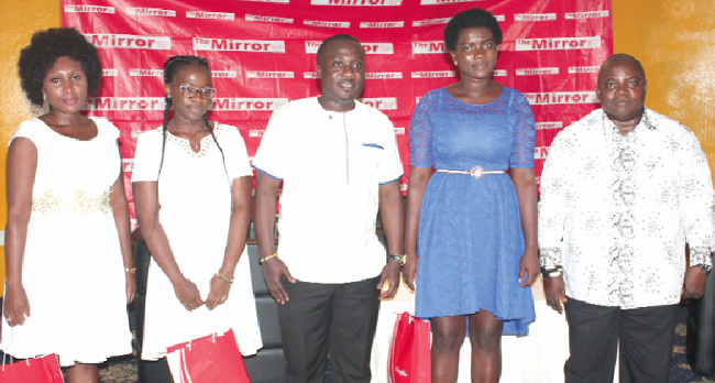 Mr Ransford Tetteh (right), the Editor of the Daily Graphic, and  Mr Prosper Ayayee (middle), the PRO of Beige Capital, with the top three winners of the Fathers’ Appreciation Day