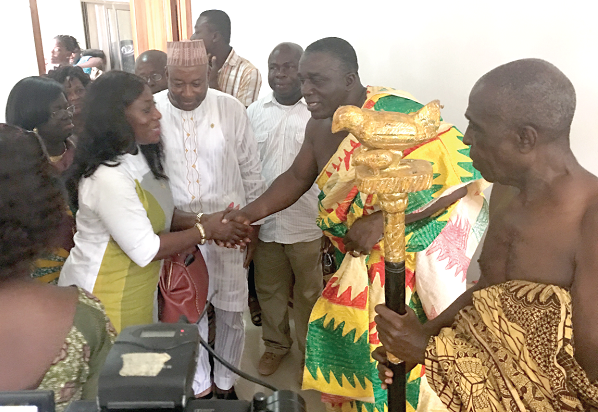 Nana Kobina Nketia (2nd right)  receiving Mrs Catherine Afeku to his palace