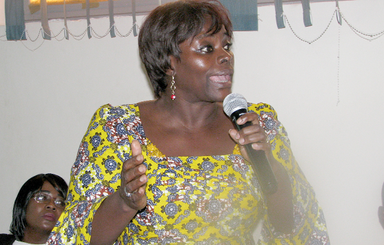 Mrs Akua  Amartey making a  contribution