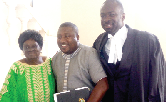 The plaintiffs, Margaret Banful and Henry Nana Boakye (middle) and their lawyer, Nana Adjei Baffuor-Awuah