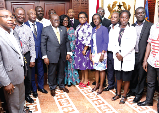 President Akufo-Addo (4th left) with members of the Ghana Pharmaceutical Council at the Flagstaff House in Accra