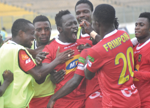 Players on bench join their teammates to celebrate Yakubu Mohammed’s winner for Kotoko