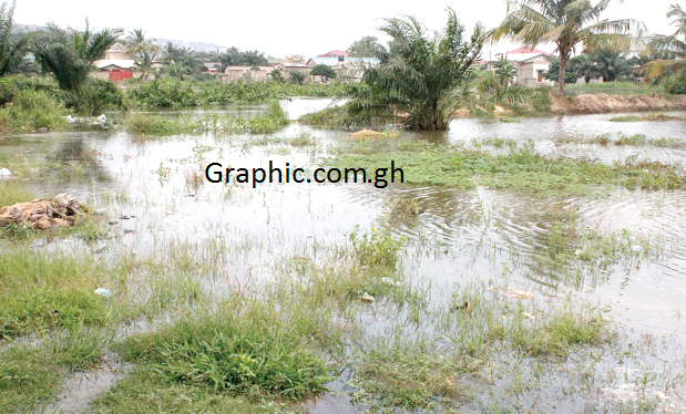 Some buildings submerged in the water at Oblogo. Picture: Caroline Boateng
