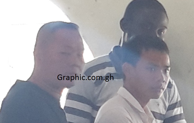 Three of the suspects in court