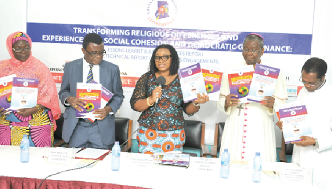 Mrs Charlotte Osei, Chairperson of the Electoral Commission (middle), launching the report. With her include (from left) Hajia Ayishetu Kadiri, Chair of the Faith Project Steering Committee, Professor Baffour Agyeman-Duah and Rev. Fr Lazarus Anondee, Secretary General of the National Catholic Secretariat
