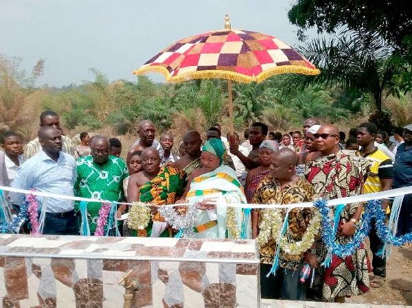 Nana Serwaa Bruwaa (arrowed), Akrokerrihemaa, commissioning the water project at the Asare Bediako SHS in Akrokerri