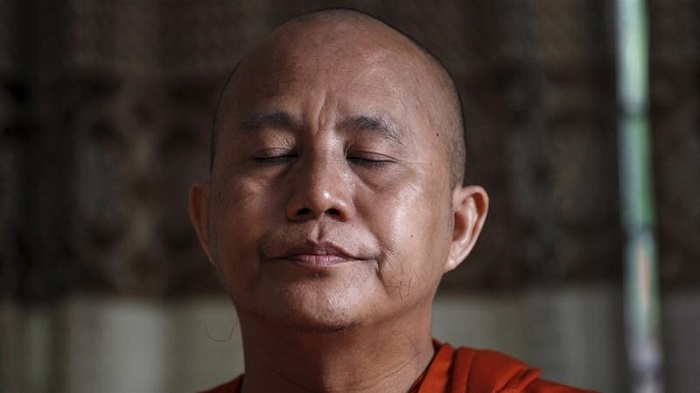 Buddhist monk Wirathu is seen in a supporter's home in Yangon in 2015 [Soe Zeya Tun/Reuters]