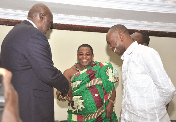 Nana Appiagyei Dankawoso I (middle), president of the GNCC, interacting with Mr Kenneth Thompson (left), CEO, Dalex Finance  and Professor Godfred Bokpin (right) after the event