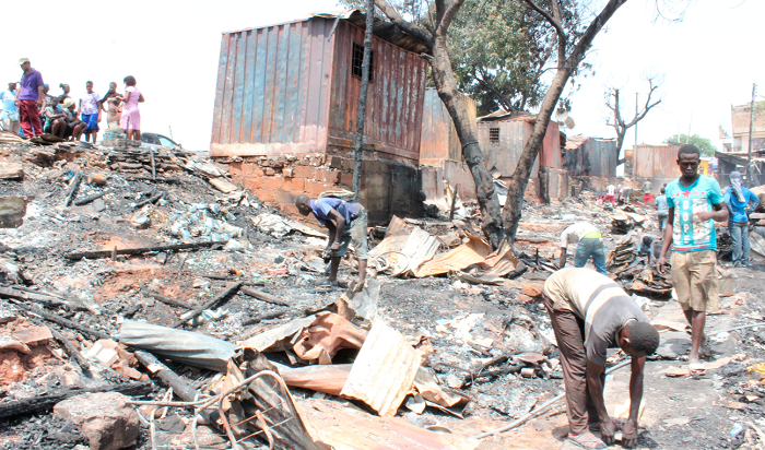 Some properties and stores destroyed during a fire outbreak at Odorkor Tipper. Picture: BENEDICT OBUOBI