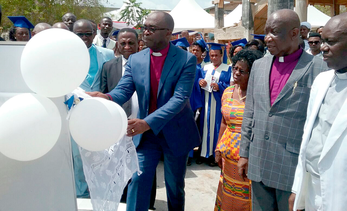  Rev Komla Darke (left) unveilling the plaque of the ongoing building on the Cathedral named after Rev Dr Kojo Osei-Wusah