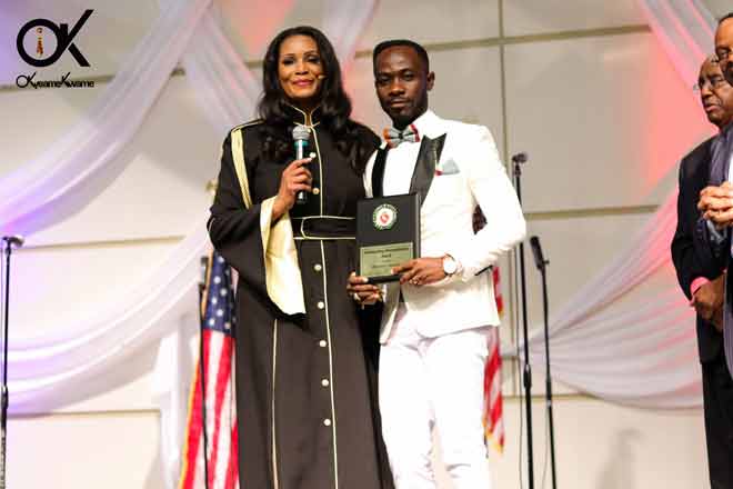 The award was presented to Okyeame Kwame by Dr. Pauline Key, on behalf of former President Barrack Obama.
