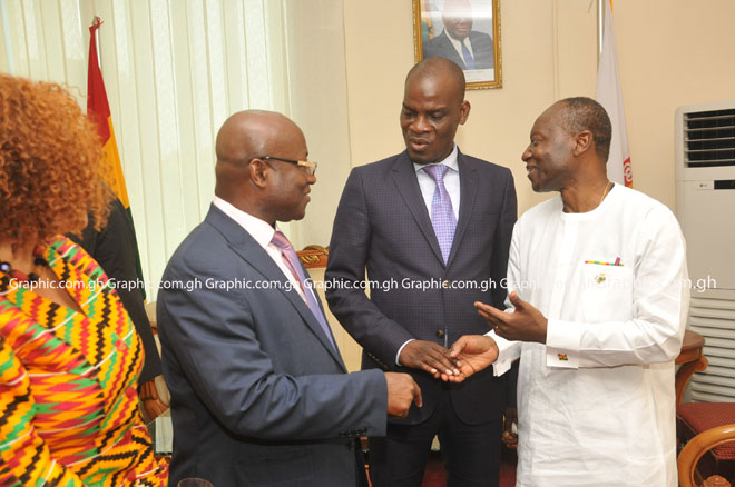 Finance Minister Ken Ofori-Atta (R) exchanging pleasantries with Minority Leader Haruna Iddrisu and Majority Leader Osei Kyei-Mensah-Bonsu