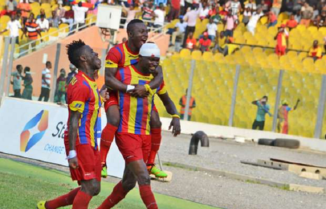 Players of Hearts join Vincent Atinga (with bandaged head) to celebrate their lone goal.  Picture: EMMANUEL QUAYE