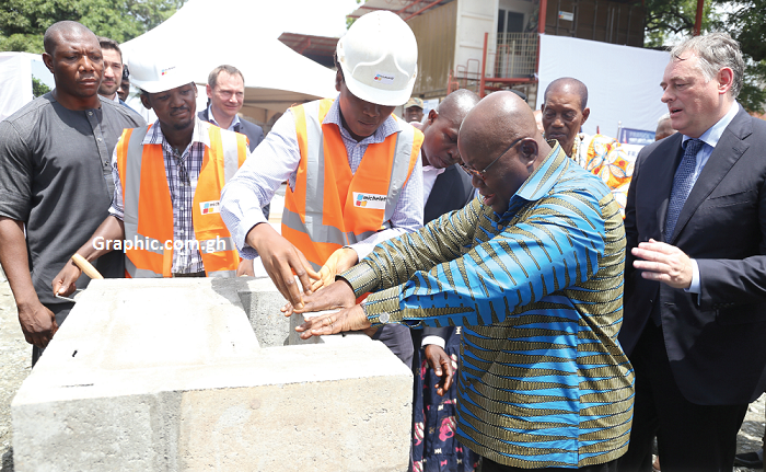 President Akufo-Addo laying a block for the sod-cutting of a new French Embassy in Accra. Looking on is Mr Francois Pujolas (right), French Ambassador to Ghana. Picture: SAMUEL TEI ADANO