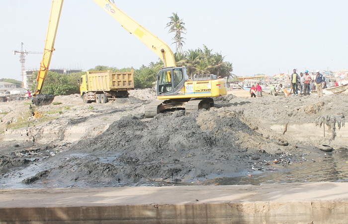 Dredging work going on at the Osu Klottey Lagoon behind the Osu Castle in Accra during a tour of the facility.