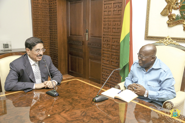 President Nana Addo Dankwa Akufo-Addo interacting with Dr Hamad bin Abdulaziz Al Kawari, an adviser to the Emir of Qatar