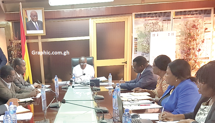  Mr Ken Ofori-Atta (head of table) interacting with members of the committee