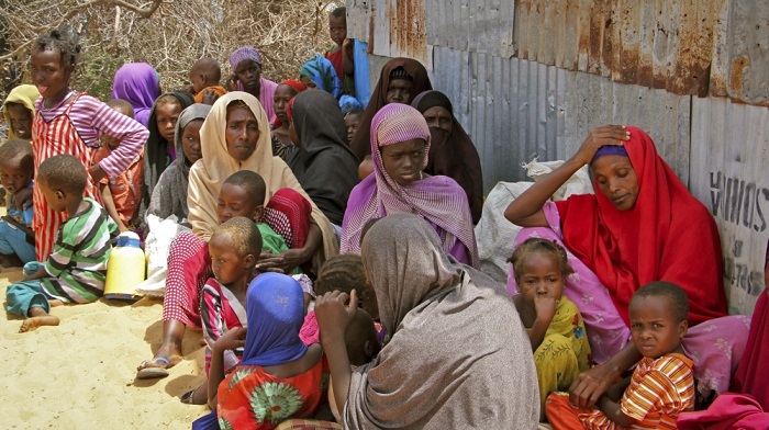 Thousands have been streaming into Mogadishu in search of food aid [Farah Abdi Warsameh/AP]