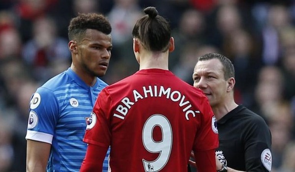 Tyrone Mings and Zlatan Ibrahimovic