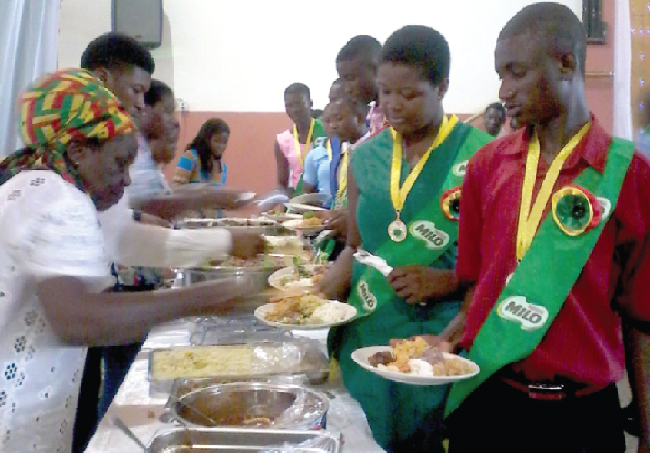 Some of the awardees being served while others await their turn