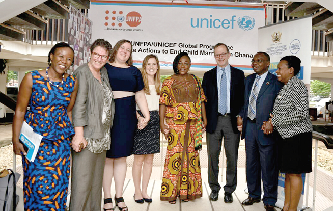 Representatives of the UNICEF/UNFPA in a group photograph. With them are Madam Erica Goldson (extreme right), Acting UNFPA Representative Madam Susan Namondo Ngongi, (extreme left) UNICEF Representative. 
