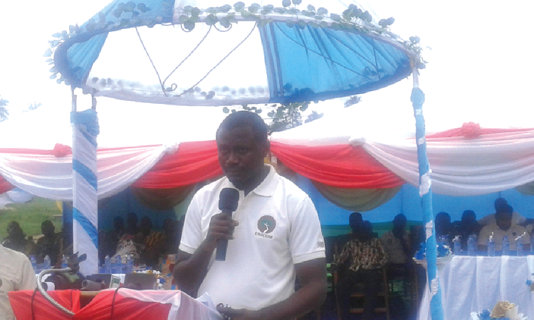 Mr Akwasi Acheampong speaking to the farmers