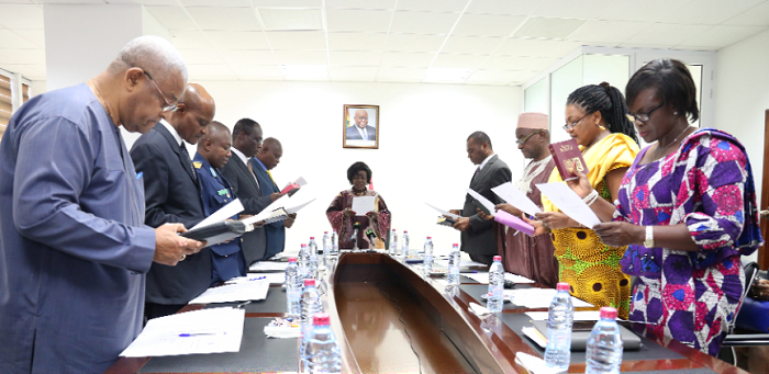  Board members swearing in the oath of secrecy at a ceremony in Accra. Picture: SAMUEL TEI ADANO