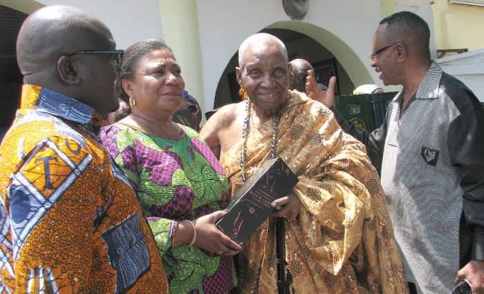 Mrs Akufo-Addo (2nd left), the First Lady, presenting  a symbolic drink to the James Town Mantse, Nii Obrempong Kojo Ababio V. Looking on are  Mr Stanley  Nii Adjiri Blankson (right), Council of State member and Nii Adjei Sowah (left), Chief Executive Officer of the Accra Metropolitan Assembly. Picture: ESTHER ADJEI