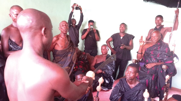 Nana Kwame Buabeng Banie (with a sword) swearing an oath of allegiance to Nana Fobi Kropa III