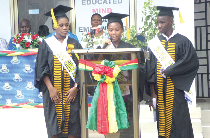 The outgoing prefect, Maame Serwaa Kessie reading her speech at the graduation ceremony.