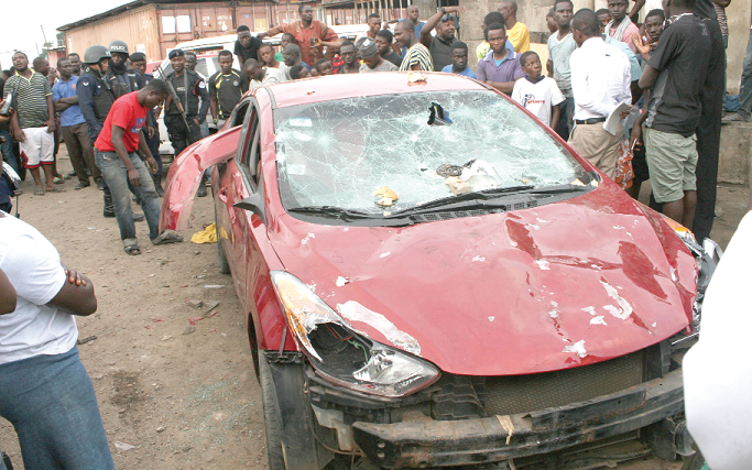 The car that was vandalised by the mob after the owner allegedly shot at a mechanic