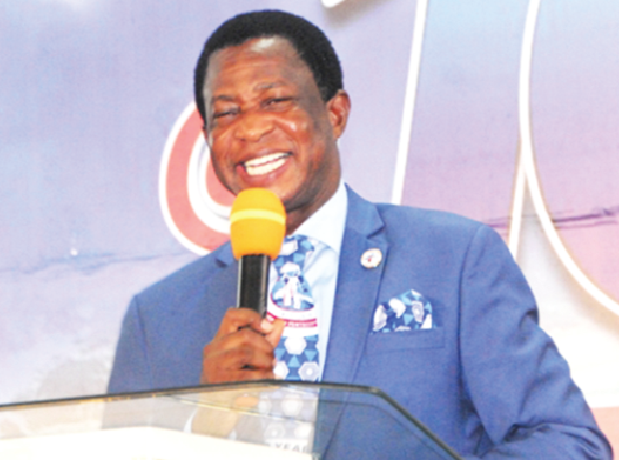 Apostle Amoani addressing the congregation