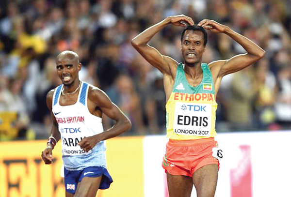 Muktar Edins celebrating his victory with Mo Farah’s (left) trademark celebration