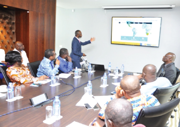 Mr. Sackey explaining a point to the members of the Select Committee on Trade, Industry and Tourism about the Single Window platform deployed by GCNet since 2002 designed to support a paperless regime