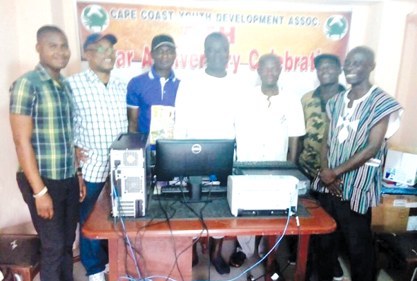 Mr Cole Arthur (3rd left) in a pose with members of the organising committee, including Mr Twintoh Walker (2nd left)
