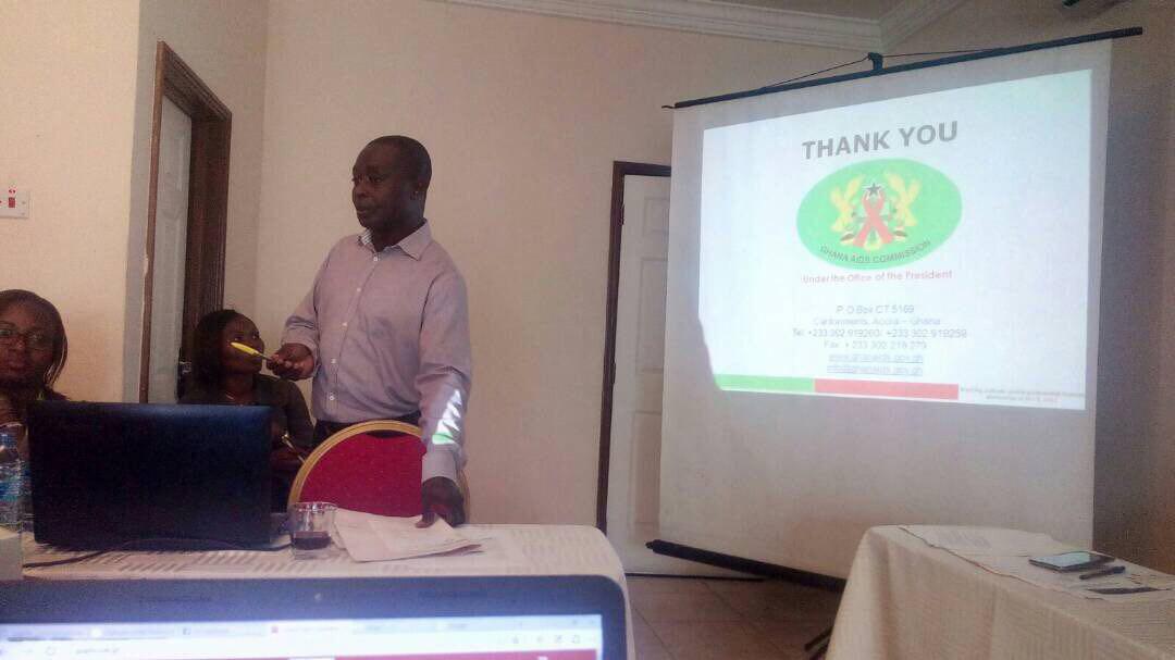 The acting Director of Technical Services at the Ghana AIDS Commission, Mr Cosmos Ohene-Adjei making a presentation at the workshop